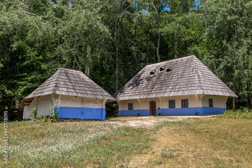 Ancient Ukrainian house, Historical house of the Ukrainian people. Ancient houses under straw. House under the straw