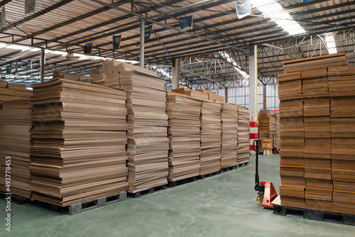 Stack of Corrugated Paper Preparing For Packaging in Factory