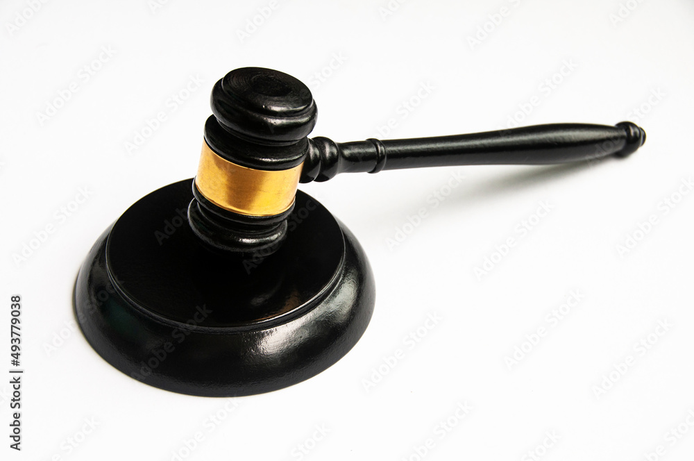Top view of gavel on white background. Law concept. Top view of gavel on white background. Law concept.