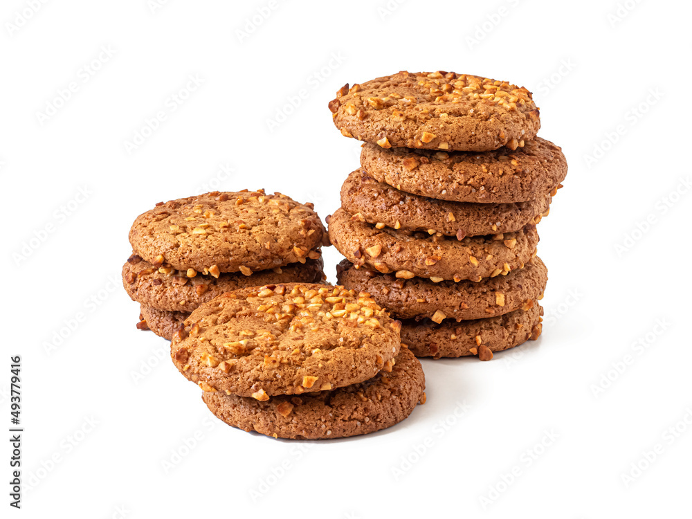 Sweet round oatmeal cookies with peanuts on a white background Sweet round oatmeal cookies with peanuts on a white background