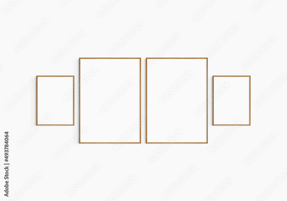 Gallery wall mockup. Set of 4 cherry wood frames. Gallery wall frame mockup. Two 50x70 (5:7) and two 30x40 (3:4) wooden frames. Gallery wall mockup. Set of 4 cherry wood frames. Gallery wall frame mockup. Two 50x70 (5:7) and two 30x40 (3:4) wooden frames.