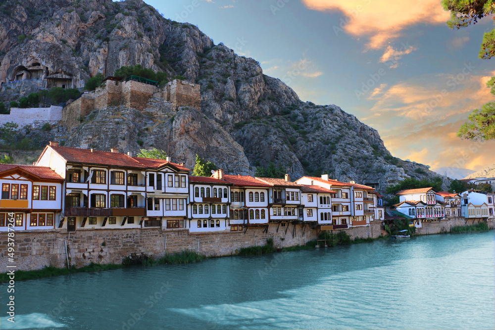 Fascinating view of the city of Amasya, also known as the city of princes. wonderful clouds coming out of the mountains. YESILIRMAK river.