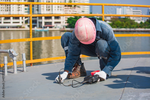 Male worker are for inspection ultrasonic thickness roof plate top