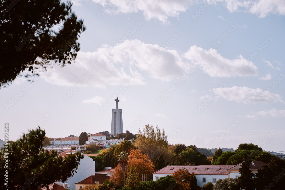 Famous monument of Jesus Christ in Lisbon against sky. Old town view.