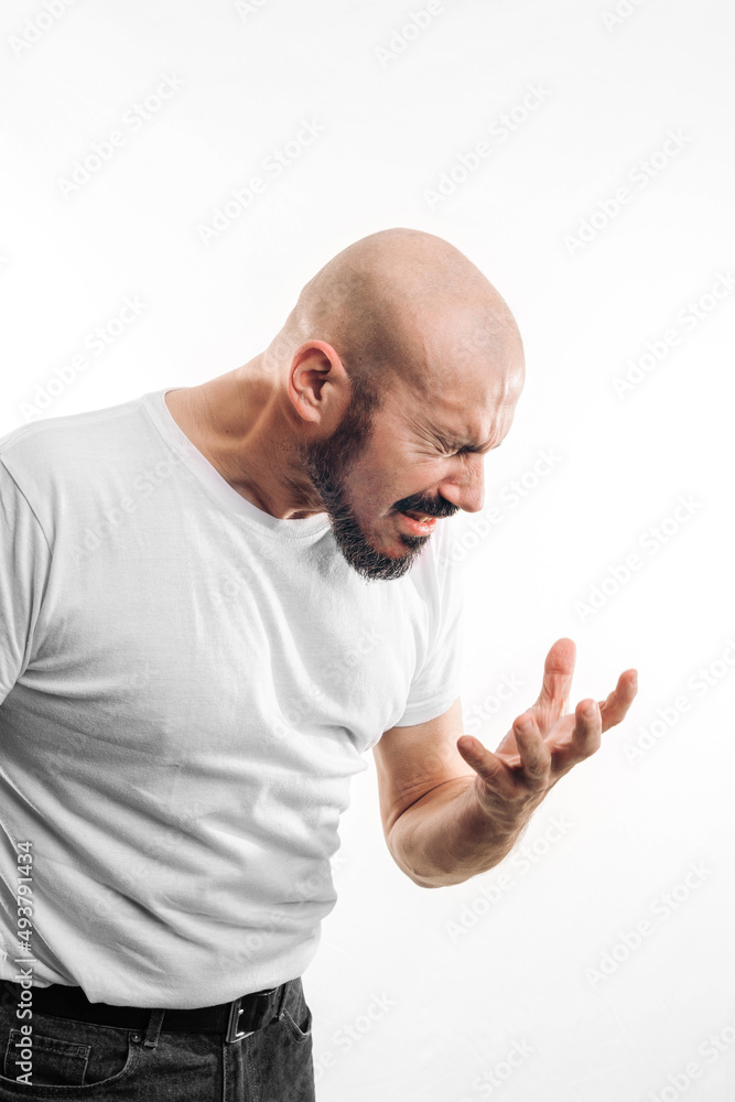 Man with gesture of pain. Person of 40 with eyes closed on white background. Health, consequences, human body Man with gesture of pain. Person of 40 with eyes closed on white background. Health, consequences, human body