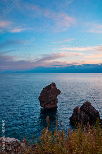 Fototapeta Naklejka Na Ścianę i Meble -  Sea cliffs and rocks on the Antalya coast. Beautiful sunset landscape.