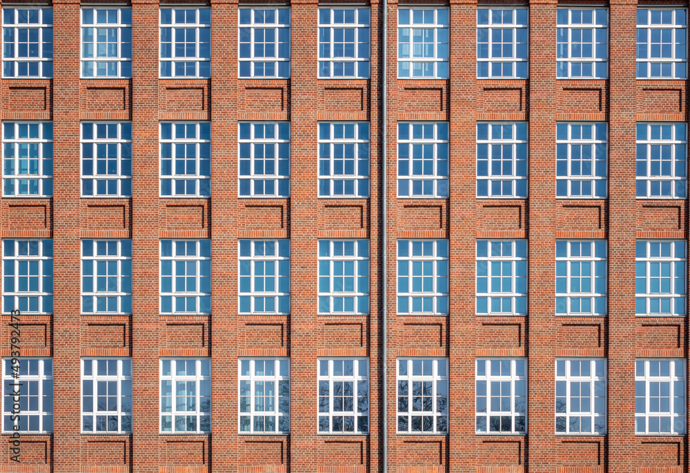 Facade from an tall old brick building Facade from an tall old brick building