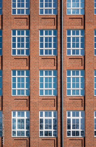 Facade from an tall old brick building 