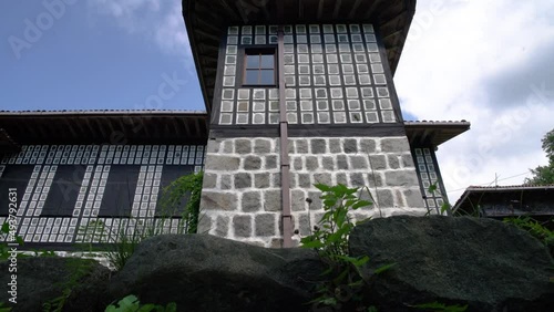 Wallpaper Mural Slider dolly 4K shot of houses made of wood and stone in local architectural style in Rize. Torontodigital.ca