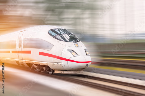 Modern high speed passenger train. Motion blur effect. photo