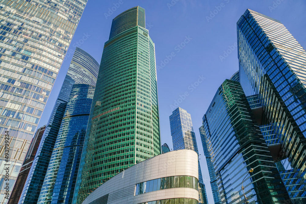 Skyscrapers in the business center, financial district, sunny day, blue sky, empty space, Moscow city, Russia. Skyscrapers in the business center, financial district, sunny day, blue sky, empty space, Moscow city, Russia.