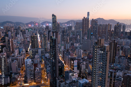 Hong Kong city at sunset time © leungchopan
