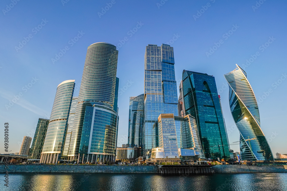 Skyscrapers in the business center, financial district, sunny day, blue sky, empty space, Moscow city, Russia. Skyscrapers in the business center, financial district, sunny day, blue sky, empty space, Moscow city, Russia.