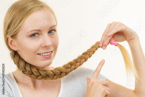 Blonde young woman with braid hair
