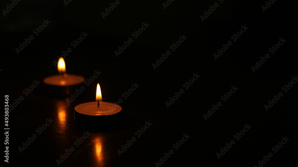 Two candle light burning in the dark place. For using in traditional activity and rite. Two candle light burning in the dark place. For using in traditional activity and rite.