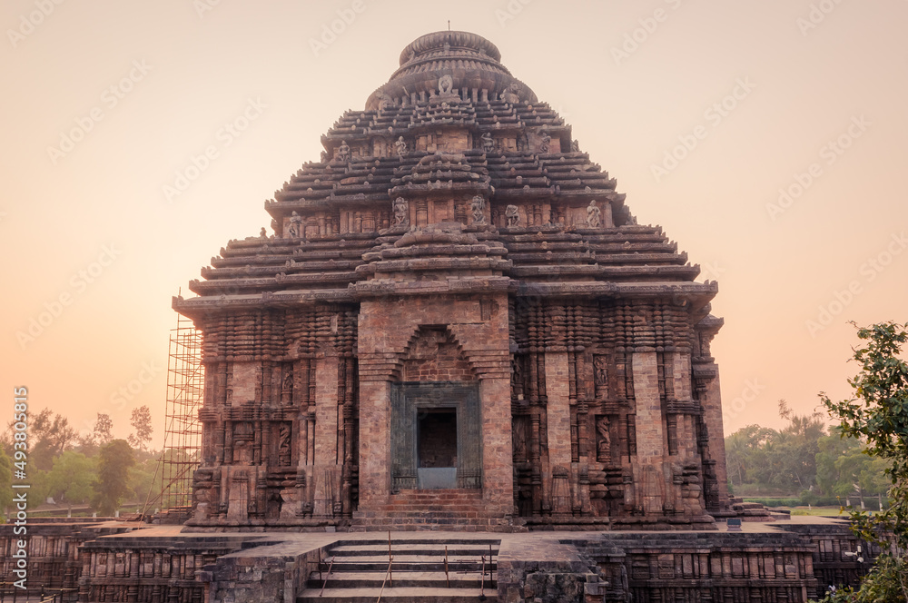 Fototapeta premium 800 year old Sun Temple, Konark Odisha, India. Designed as a chariot consisting of 24 wheels which are sundials to measure movement of sun and planets. Unesco World Heritage Site.