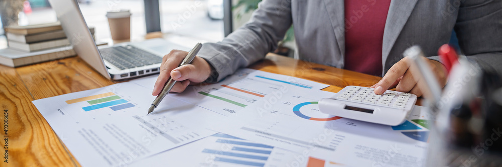 Accountant or banker making calculations Bookkeeper Clerk, Bank Advisor And Auditor. Accounting concept Accountant or banker making calculations Bookkeeper Clerk, Bank Advisor And Auditor. Accounting concept