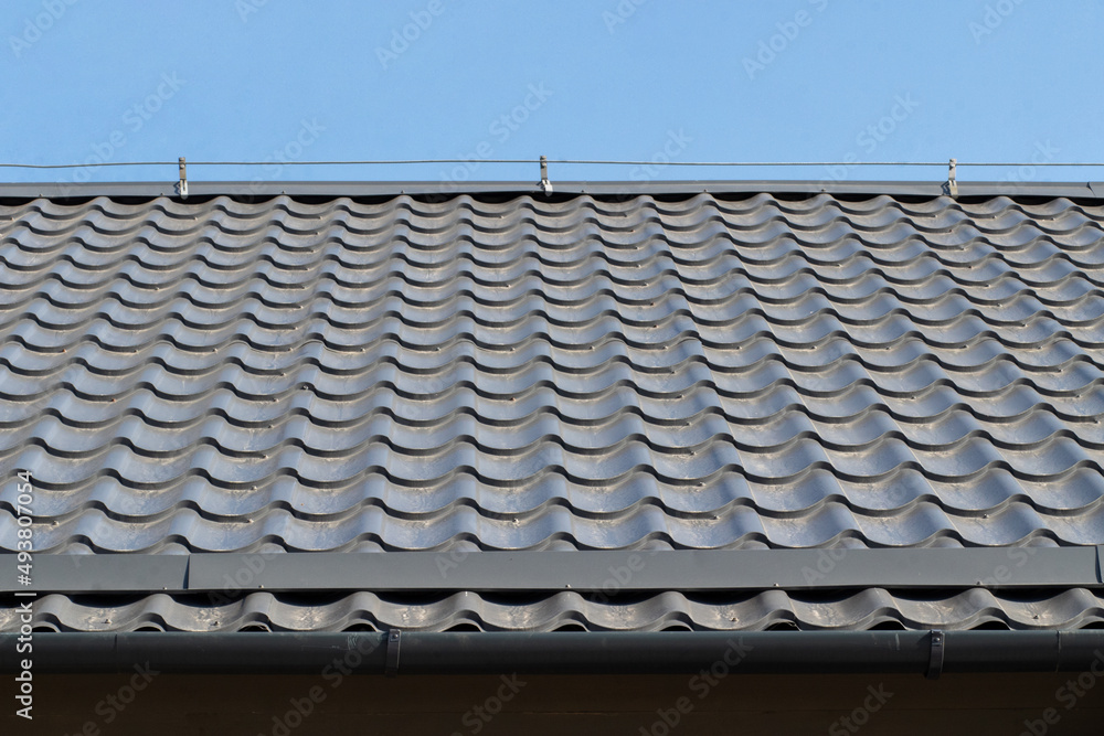 The roof of the house made of tiles