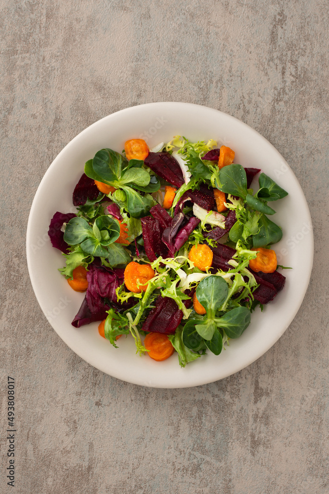 Warm salad with mixed salad with boiled carrots and beetroot with spices Warm salad with mixed salad with boiled carrots and beetroot with spices