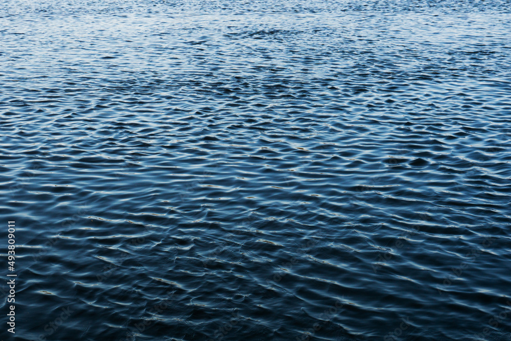 Ocean wave background. Bubble water foam backdrop. Turbulent sea texture. Messy water flow. Ripples on lake water. Ocean wave background. Bubble water foam backdrop. Turbulent sea texture. Messy water flow. Ripples on lake water.