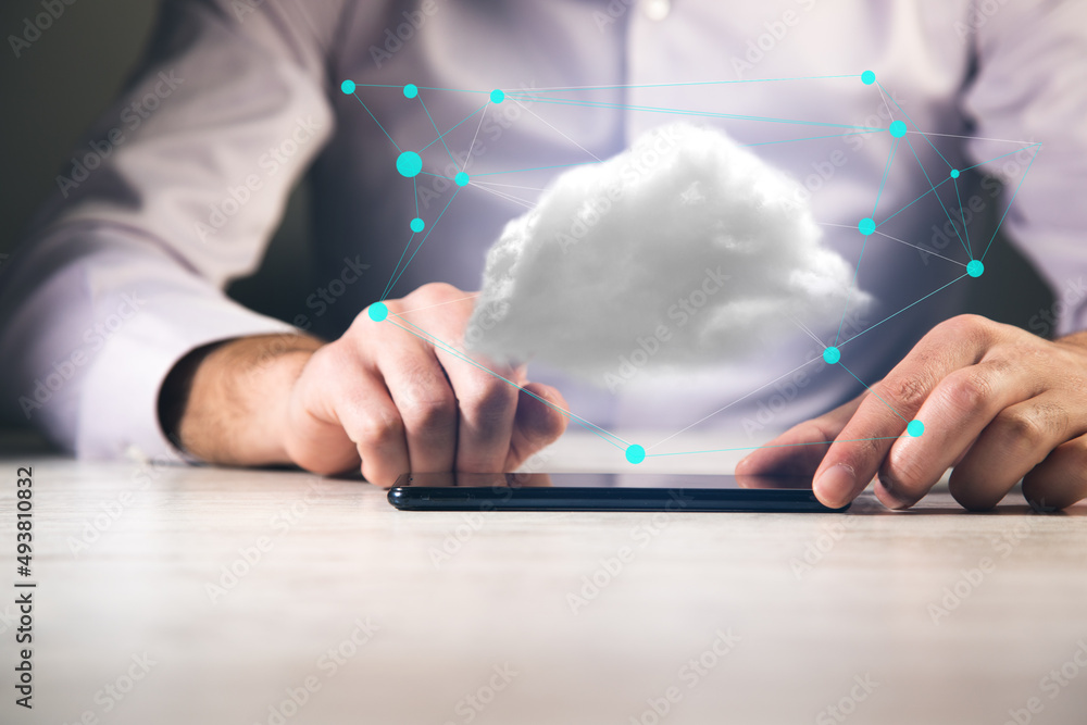 holding tablet with cloud network technology concept holding tablet with cloud network technology concept