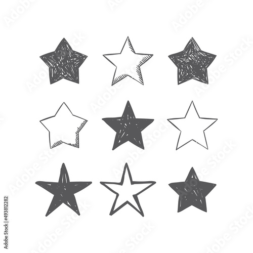 Hand drawn star icons. Set of doodle stars.