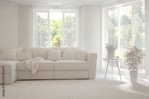 Mock up of stylish room in white color with sofa and green landscape in window. Scandinavian interior design. 3D illustration © AntonSh