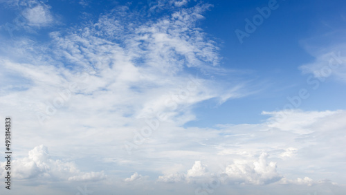 Fototapeta Naklejka Na Ścianę i Meble -  blue sky background with white clouds cumulus floating soft focus, copy space.