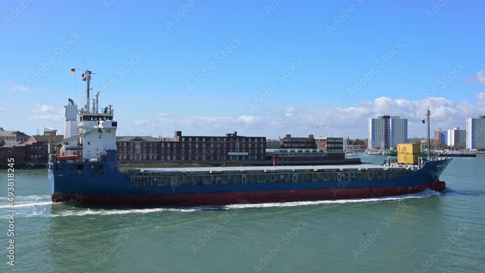 A large German registered cargo ship arriving in Portsmouth Harbour from Hamburg with Gosport in the background. A large German registered cargo ship arriving in Portsmouth Harbour from Hamburg with Gosport in the background.