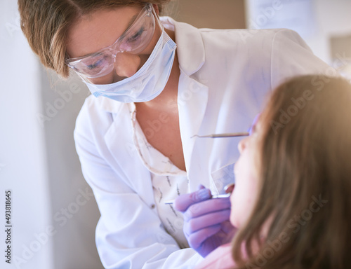 My goal is to provide exceptional care for your child. Cropped shot of a dentist examining a little girls teeth.
