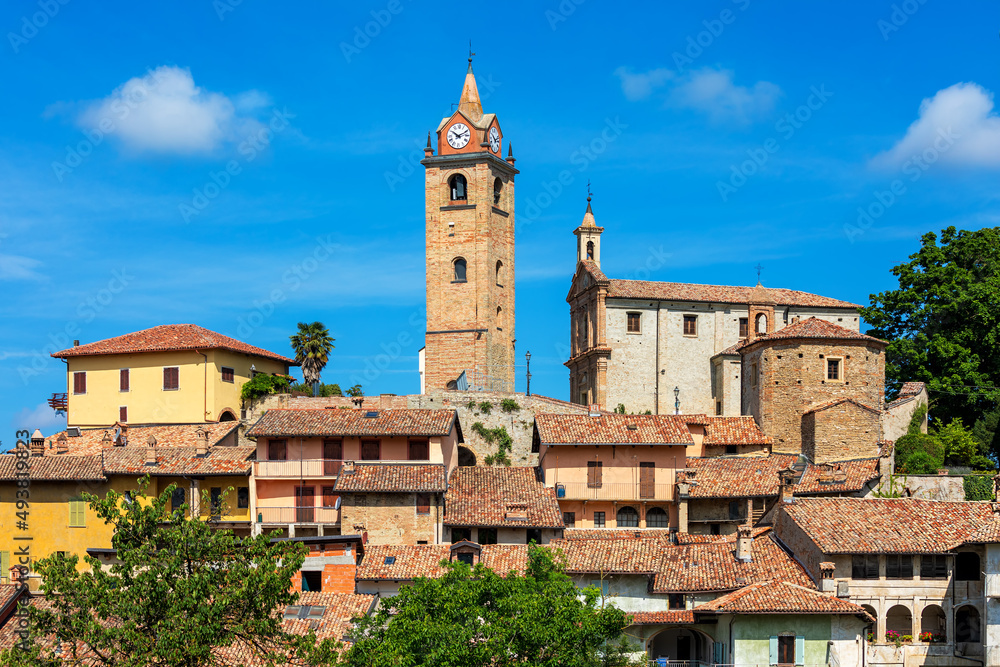 Old houses and bell tower in Monforte d'Alba, Italy.