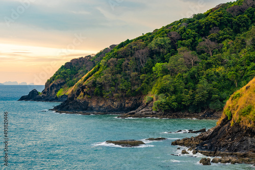 Island and sea at sunset.