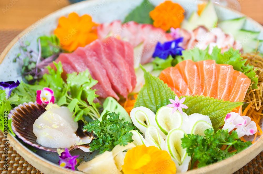 Platter decorated with different flavors of elegant sushi. Platter decorated with different flavors of elegant sushi.