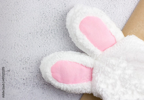 Easter bunny ears hat on a light background with copyspace