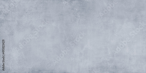 soft textured cement background in shades of blue