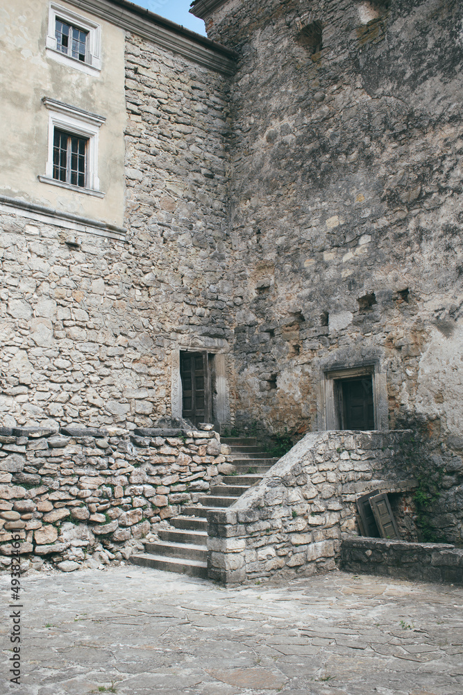 Yard and stairs in an ancient castle. Old castle in Ukraine