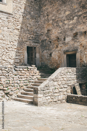 Yard and stairs in an ancient castle. Old castle in Ukraine