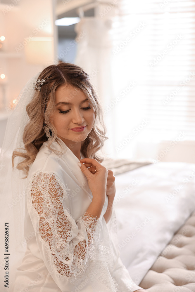 Happy bride with beautiful makeup and hairstyle at home. Wedding day Happy bride with beautiful makeup and hairstyle at home. Wedding day