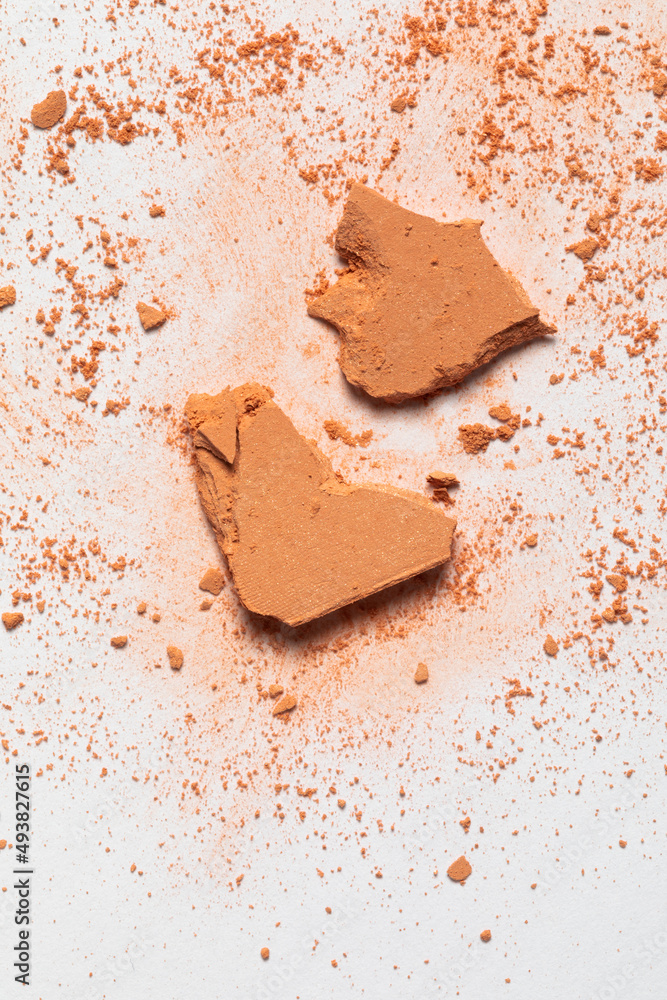 Fototapeta premium Pieces of Blush Palette Swatch Being Crushed