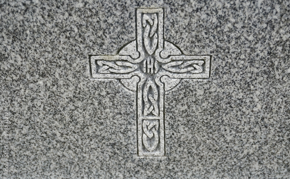 Decorative Cross Carved into Black and White Speckled Granite