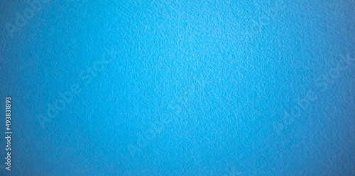 Rectangular texture of felt fabric of blue sea color.Blue background for fabric text.