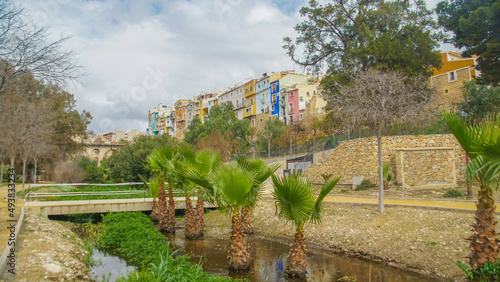 Fachadas de colores de Villajoyosa en Alicante , Costa Blanca, España, frente al cauce del rio junto a la playa photo