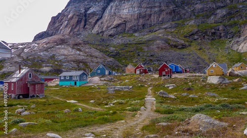 Village in Greenland with high mountain