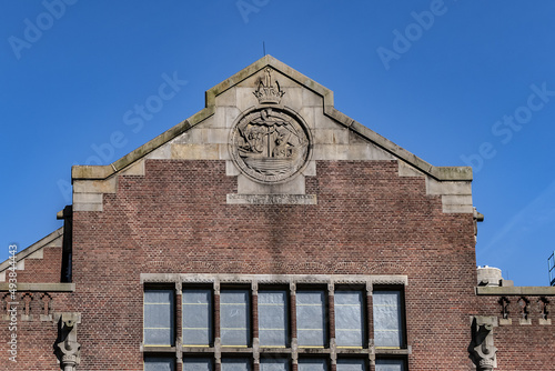 Architectural fragment of old Beurs van Berlage building (Stock Exchange by Berlage). Beurs van Berlage (now public hall) - important monument of Dutch architecture. Amsterdam, Netherlands. photo