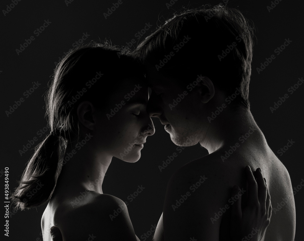 Fototapeta premium tender hugs and feelings of young guys and girls in love