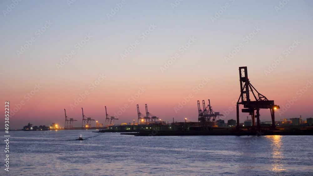 The harbour of Osaka during beautiful sunset with calm sea, Japan. High quality 4k footage. The harbour of Osaka during beautiful sunset with calm sea, Japan. High quality 4k footage.