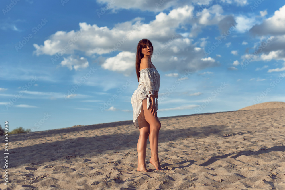 Young brunette woman on a sunny summer day Young brunette woman on a sunny summer day