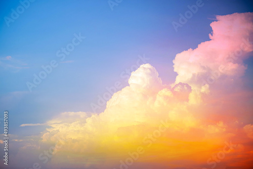 beautiful group of  orange clouds  and sunlight on the blue sky perfect for the background  take in everning Twilight sunset and sunlight on summer