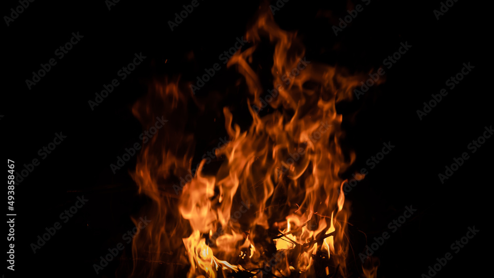 Fire flames on black background. fire burst texture for banner backdrop. Fire flames on black background. fire burst texture for banner backdrop.