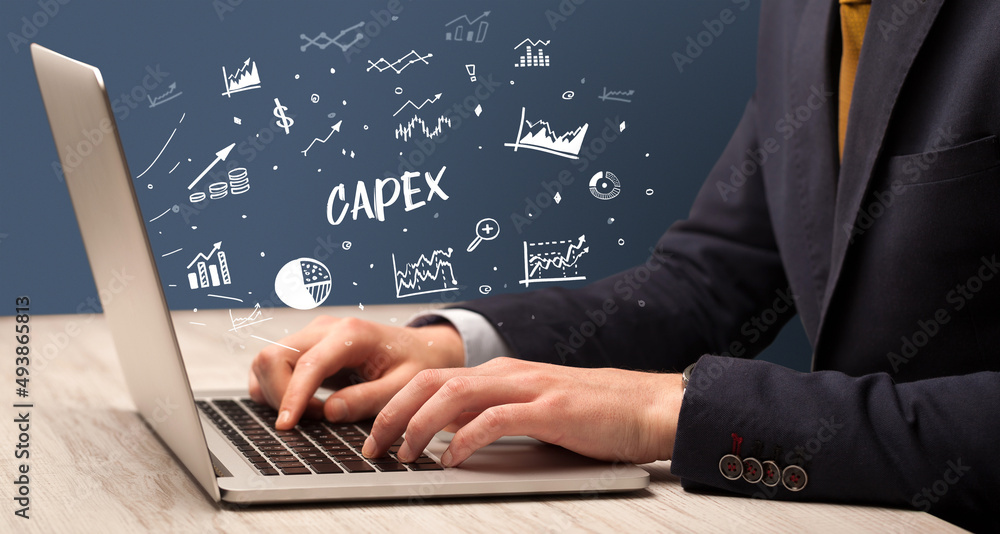 Businessman working on laptop, business concept